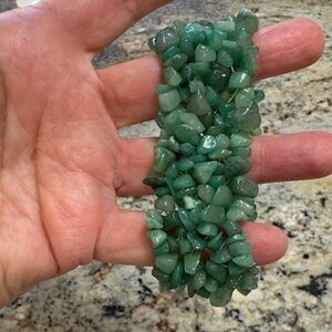 Authentic Green Stone Bracelet. Each stone is on an electric band.